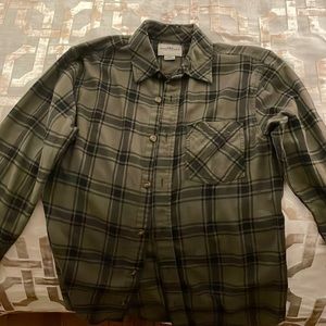 Green and black flannel. Barely worn.  Great condition.
